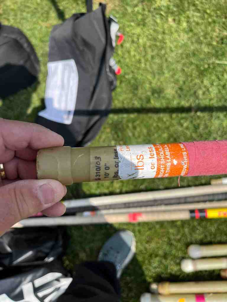 Here’s an old Pacer pole.  It “seems” to have two labels, the internal marking from the original manufacturer, and a second label added.  But here’s the deal: the internal marking – embedded in the “gel coat” IS NOT A LABEL.  Yes – it does identify the length and weight of the pole.  But it does not meet two requirements: the pole rating is not ¾ inch high, AND, this was not intended as a marker of the top hand hold.
